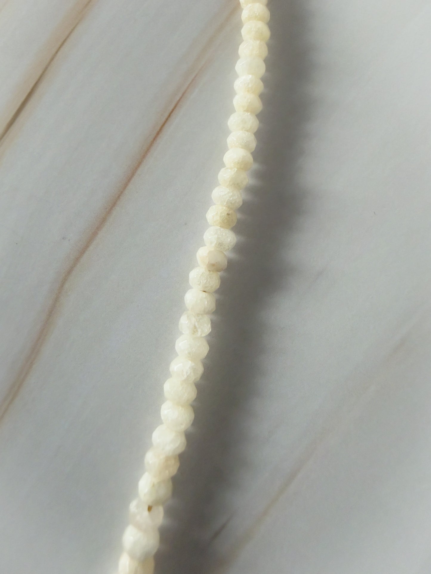String of small white jade beaded necklace